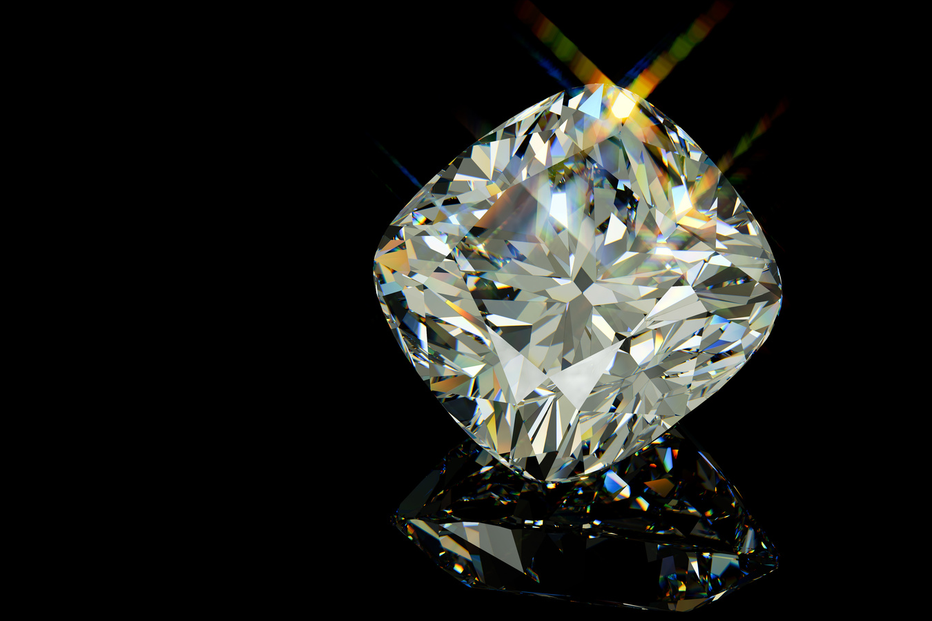 Sparkling cushion cut diamond on black glossy background